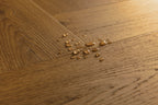 Wooden floor with water droplets on it