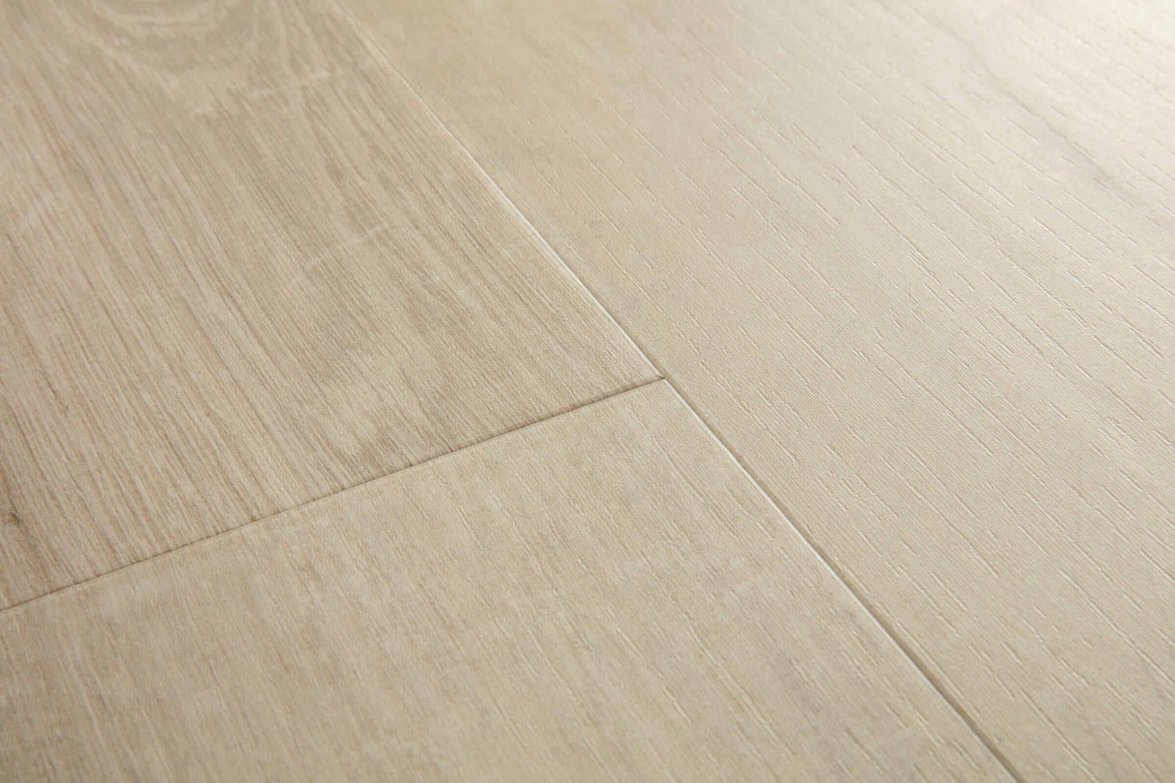 Close-up of light wood flooring with a clear finish