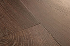 Close-up of a wooden floor with a brown finish