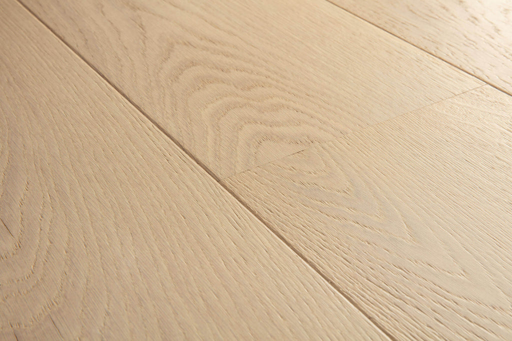 Close-up of light wood flooring with visible grain and texture