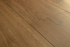 Close-up of a wooden floor with visible grain and texture