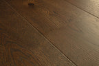 Close-up of a wooden floor with visible grain and texture