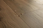 Close-up of a wooden floor with visible grain and texture