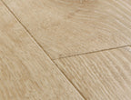 Close-up of a wooden floor with light brown planks.