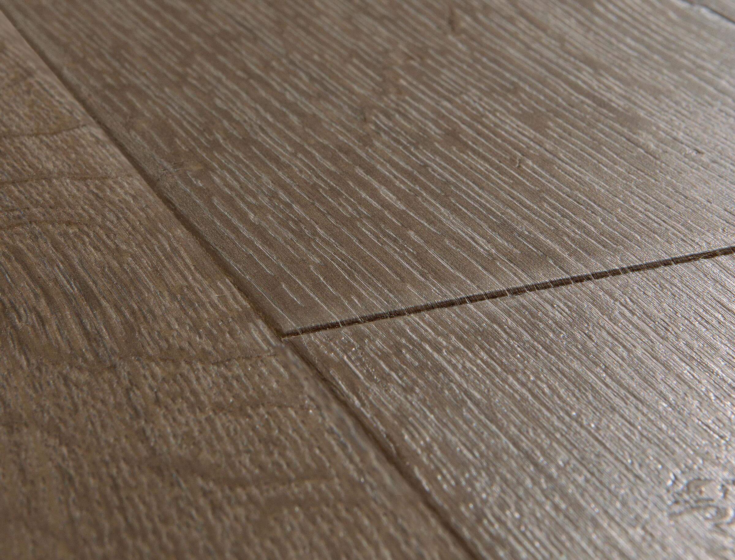 Close-up of a wooden floor with visible grain and texture