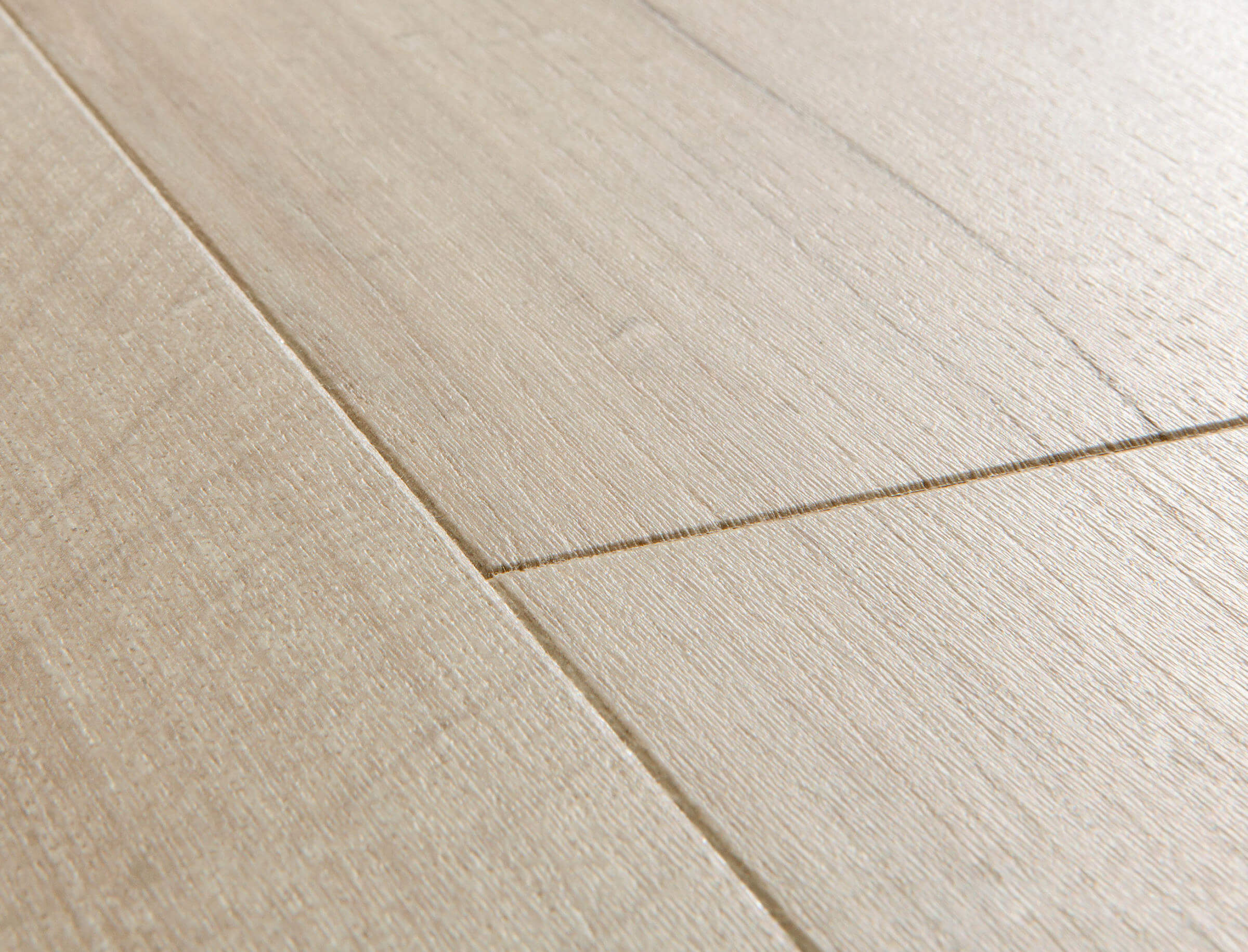 Close-up of light wood flooring with a clear finish