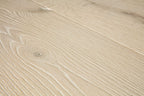 Close-up of a beige wooden surface with visible grain patterns