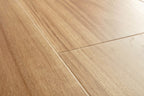 Close-up of a wooden floor with visible grain and texture