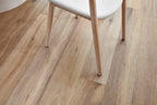Wooden floor with a chair leg on a clear protective sheet