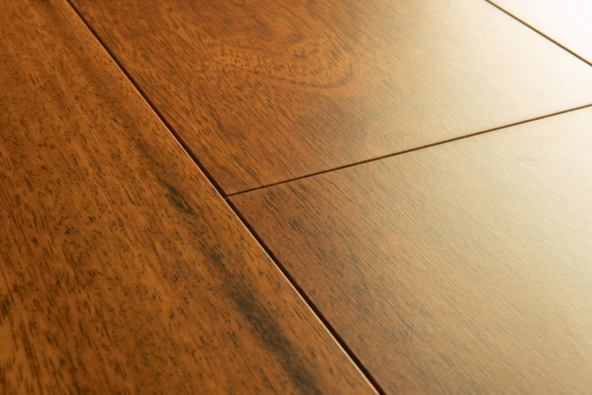 Close-up of a wooden floor with visible grain and texture