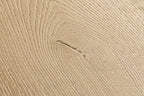 Close-up of a textured beige surface with subtle patterns