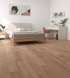Modern bedroom with wooden floor, bed, desk, and decor