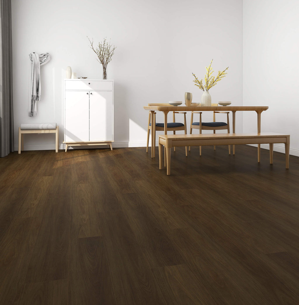 Dining room with wooden flooring, table, chairs, and a white cabinet.