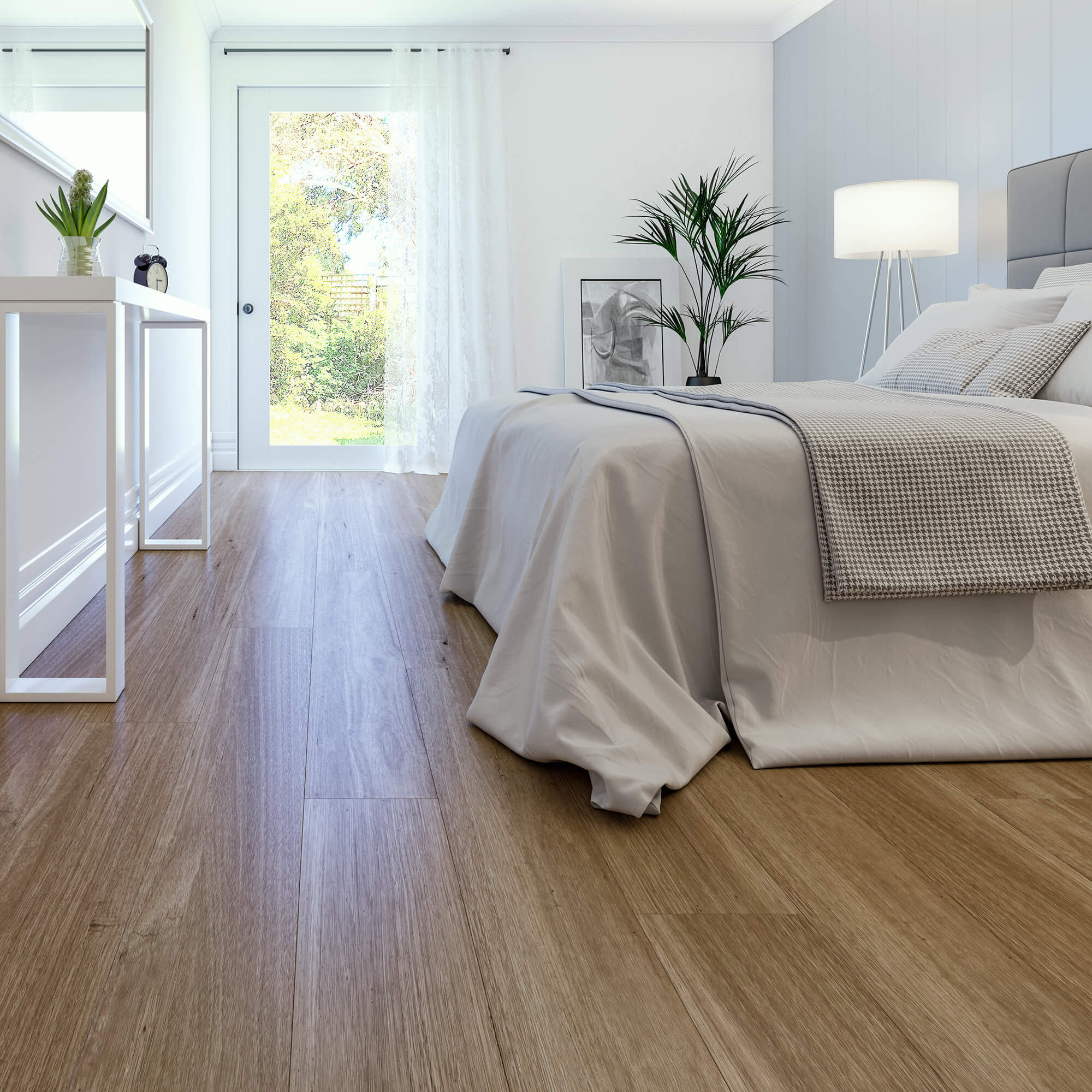 Modern bedroom with wooden flooring, bed, and decor