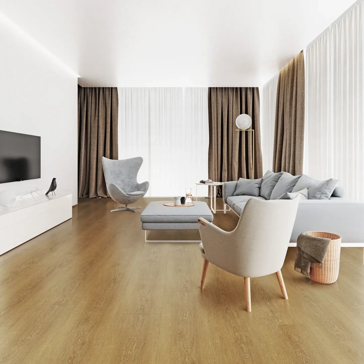 A modern living room with light oak wood flooring, featuring a white sectional sofa, a light gray accent chair, a matching ottoman, brown curtains, and a white wall-mounted TV.