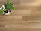 Wooden floor with a potted plant on a wooden surface